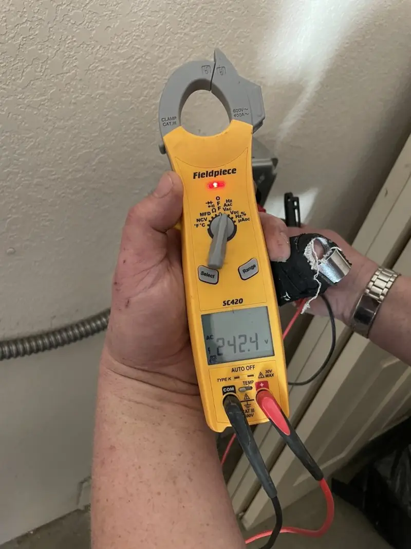 Voltage testing with clamp meter during Aluminum Wiring Replacement in Philipstown